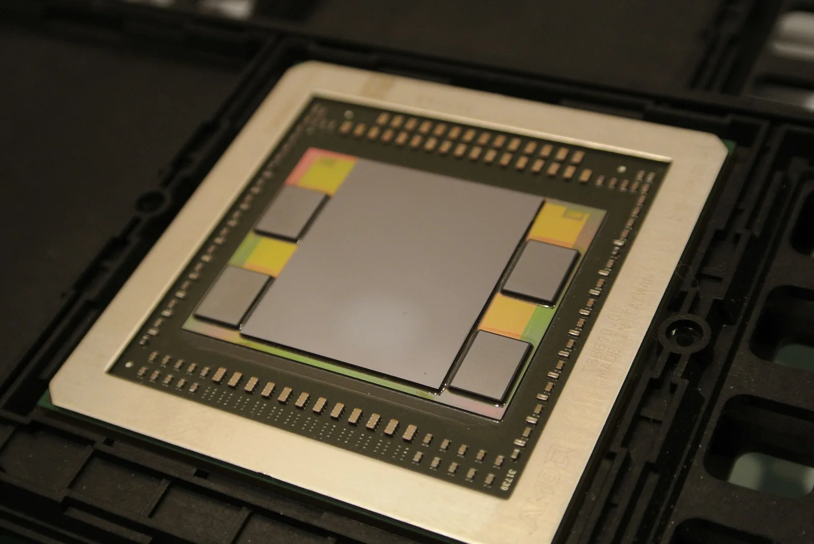 Real photo of HBM stacks and interposer on an AMD Fiji GPU package