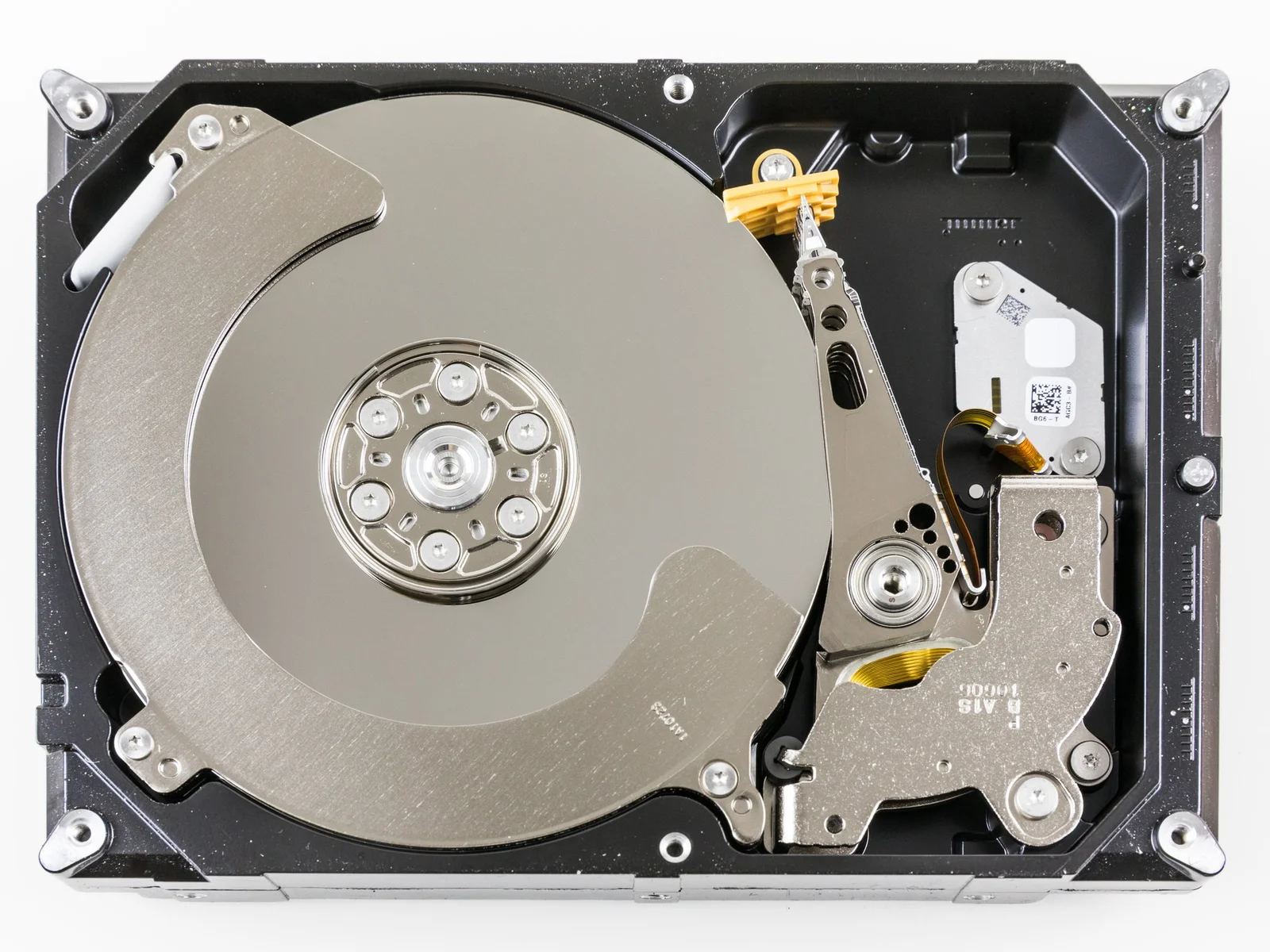 Real photo of the platters and head inside a Seagate mechanical disk